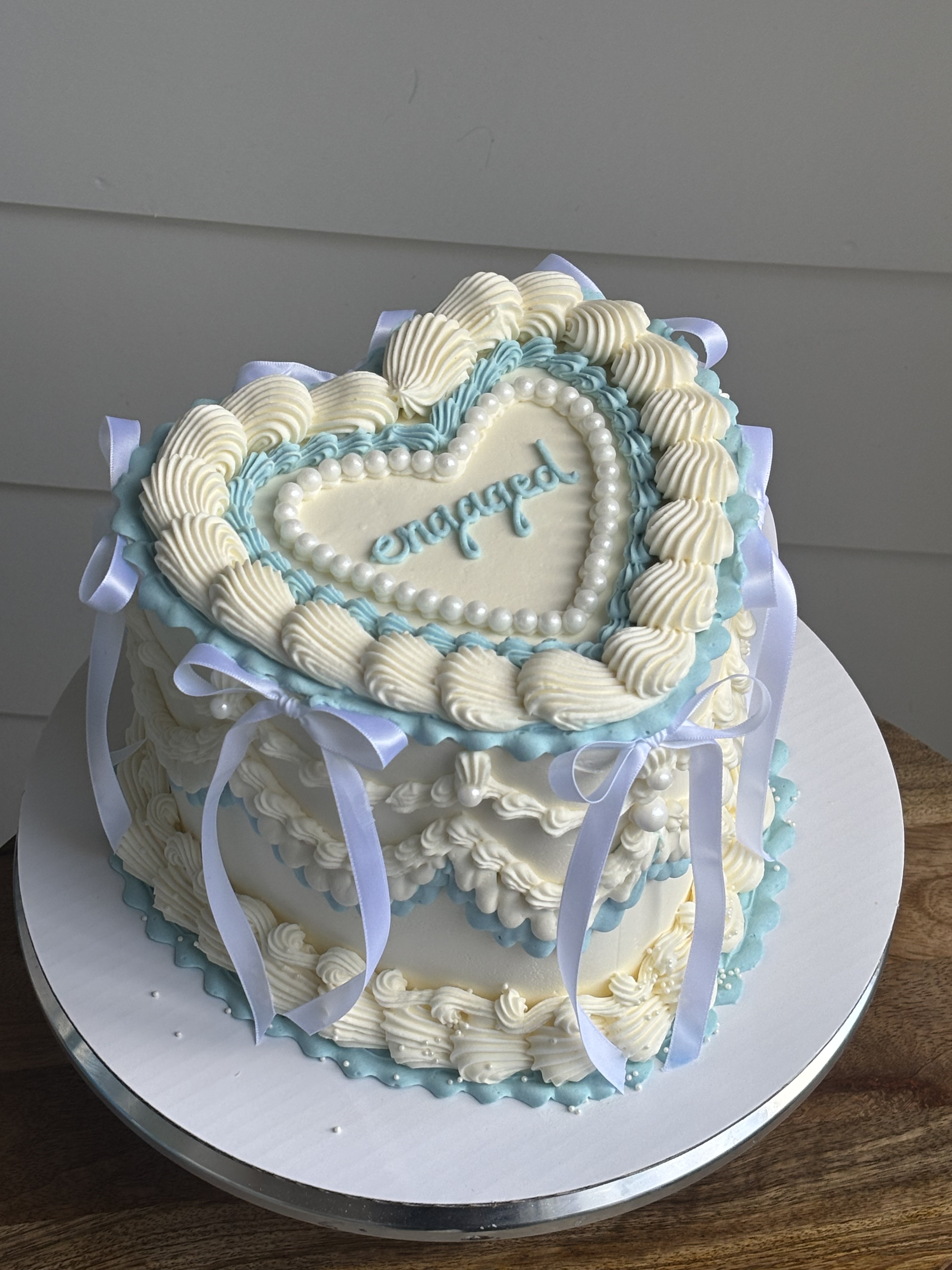 Blue engaged heart cake