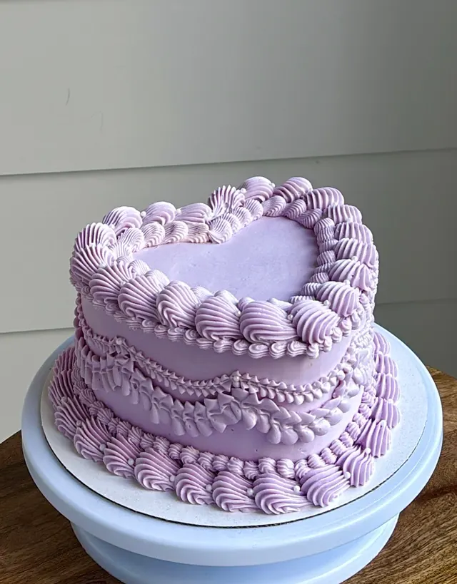 Lavender heart cake with layered shell and swag piping