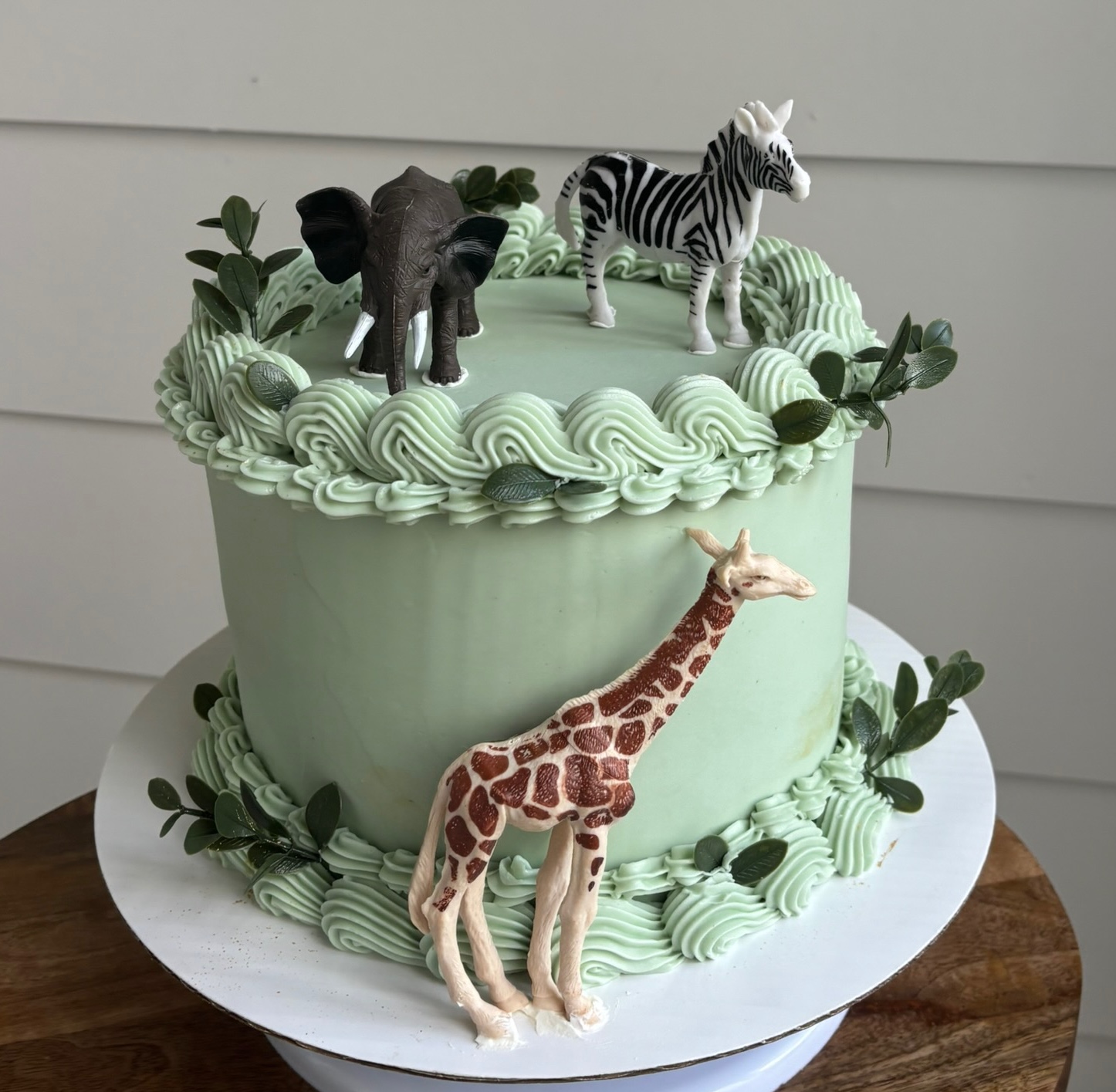 Green animal themed cake
