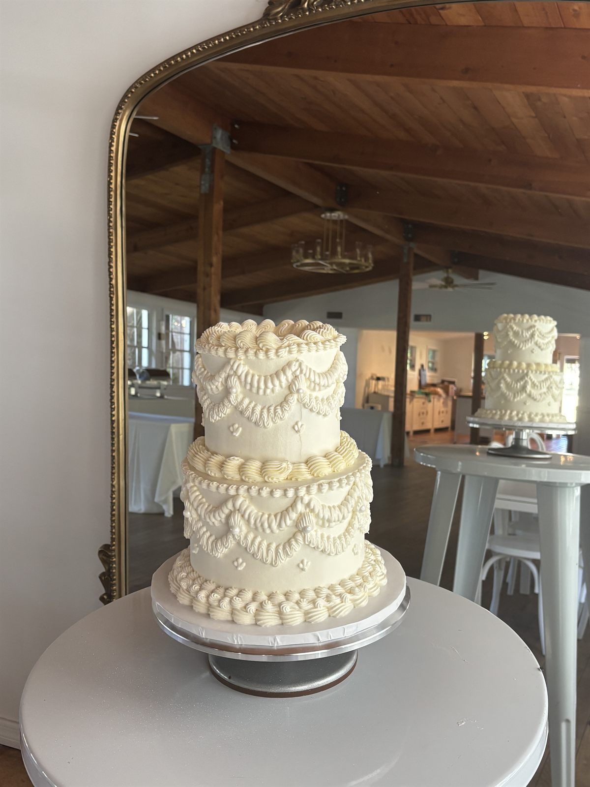 Ivory two-tier vintage wedding cake