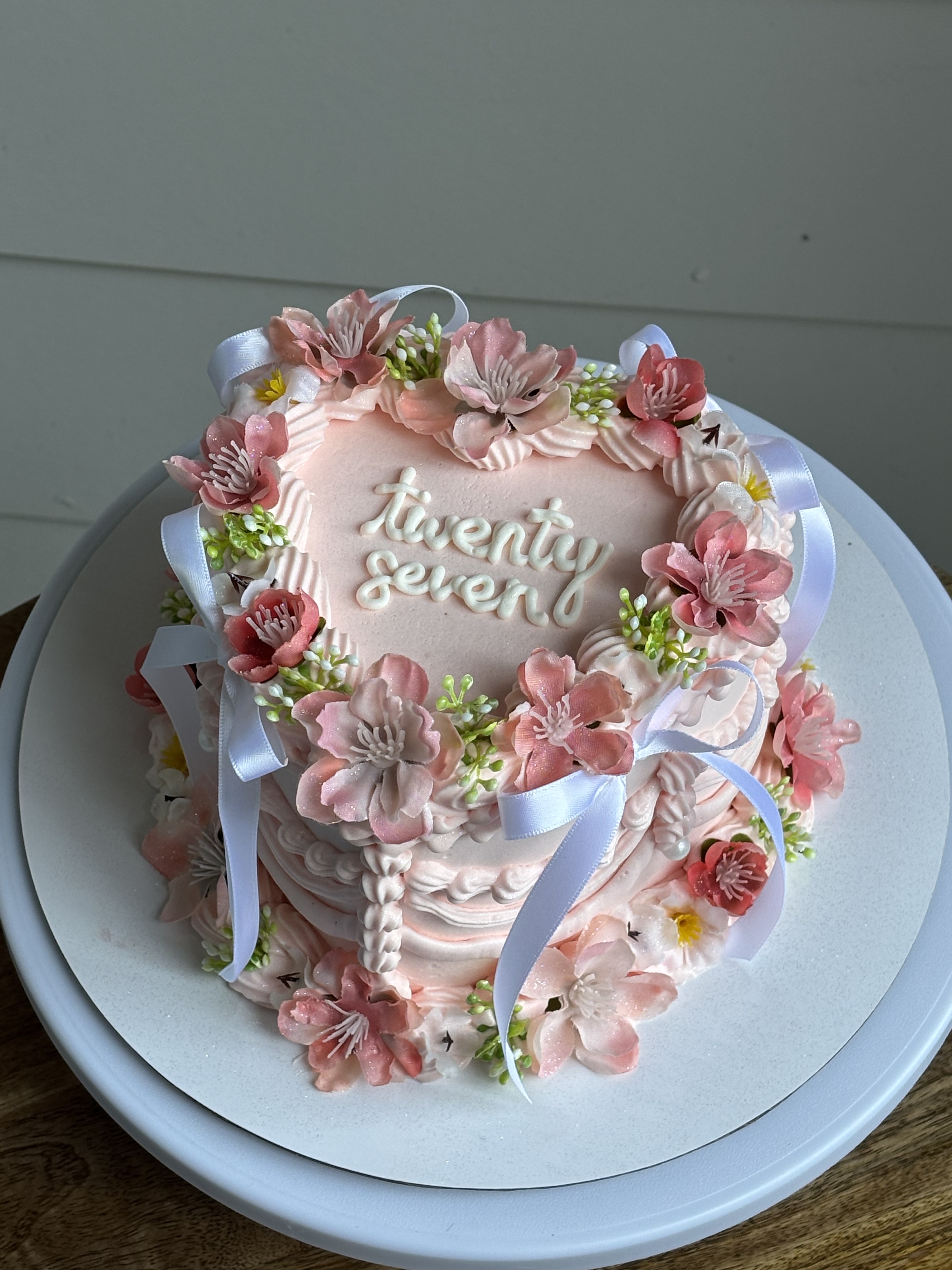 Pink floral 27 heart cake