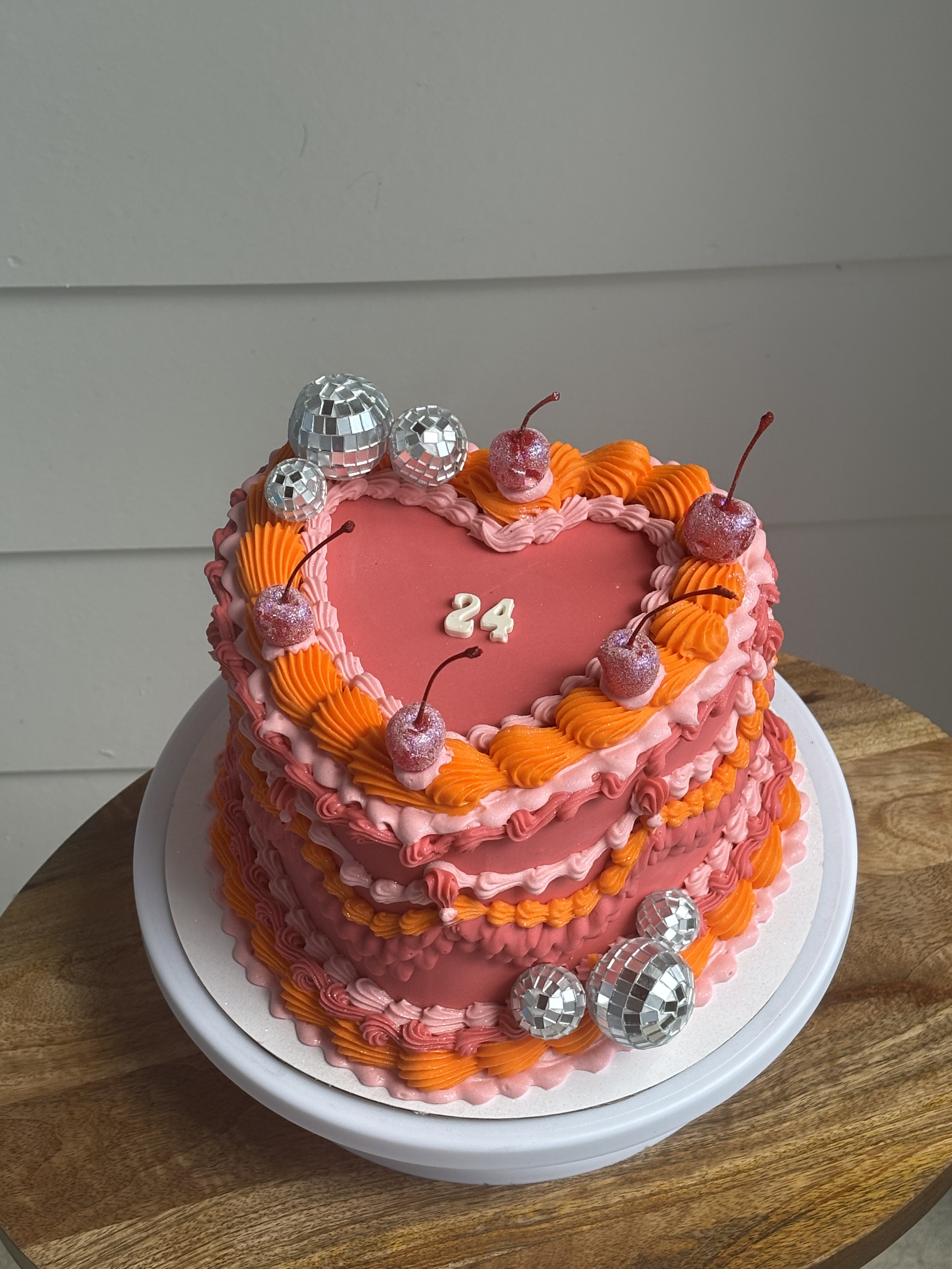 Pink orange disco heart cake