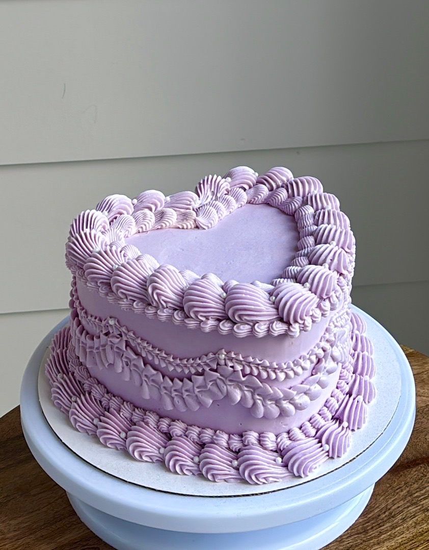 Purple themed heart cake