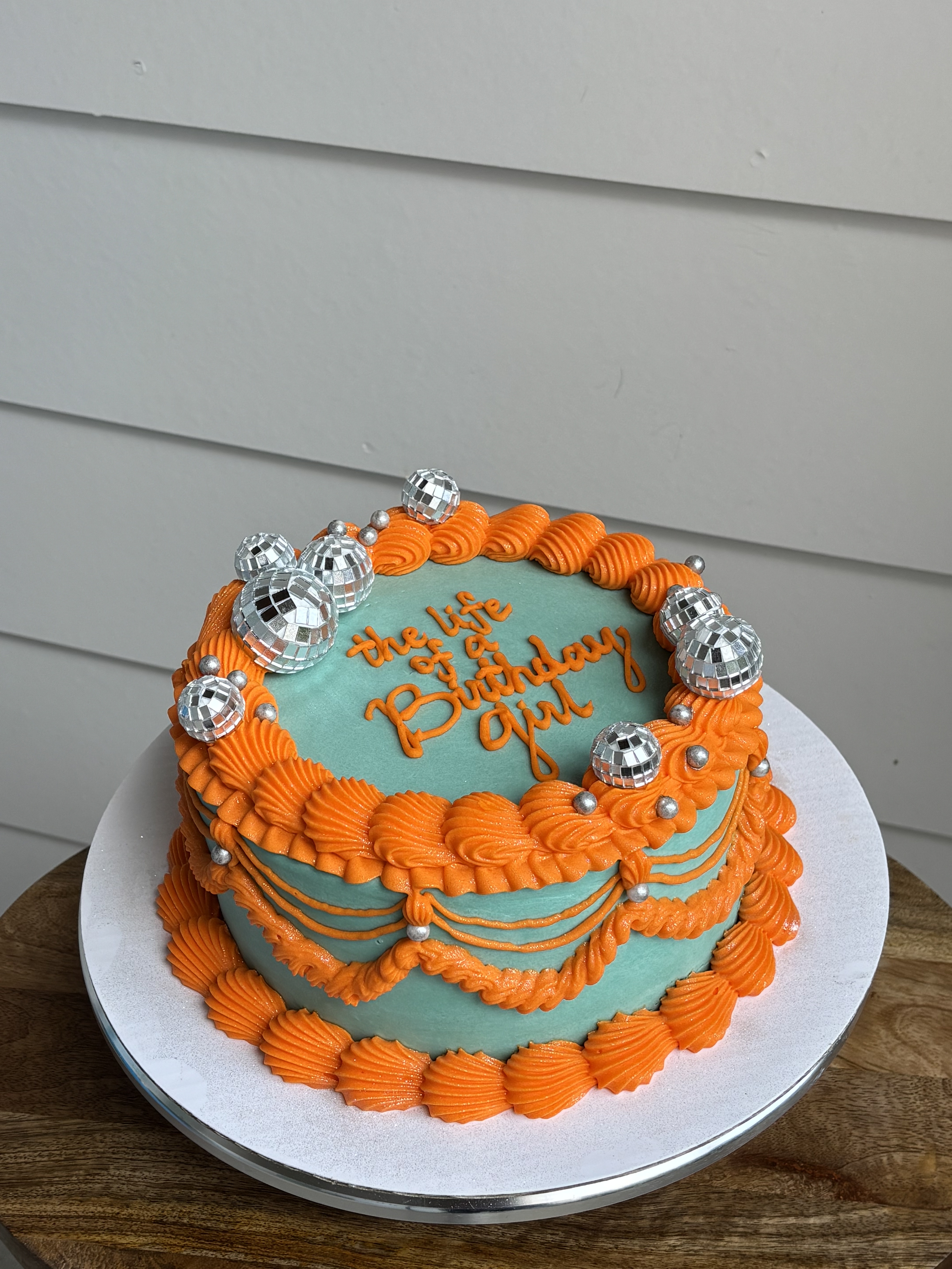 Teal orange disco cake