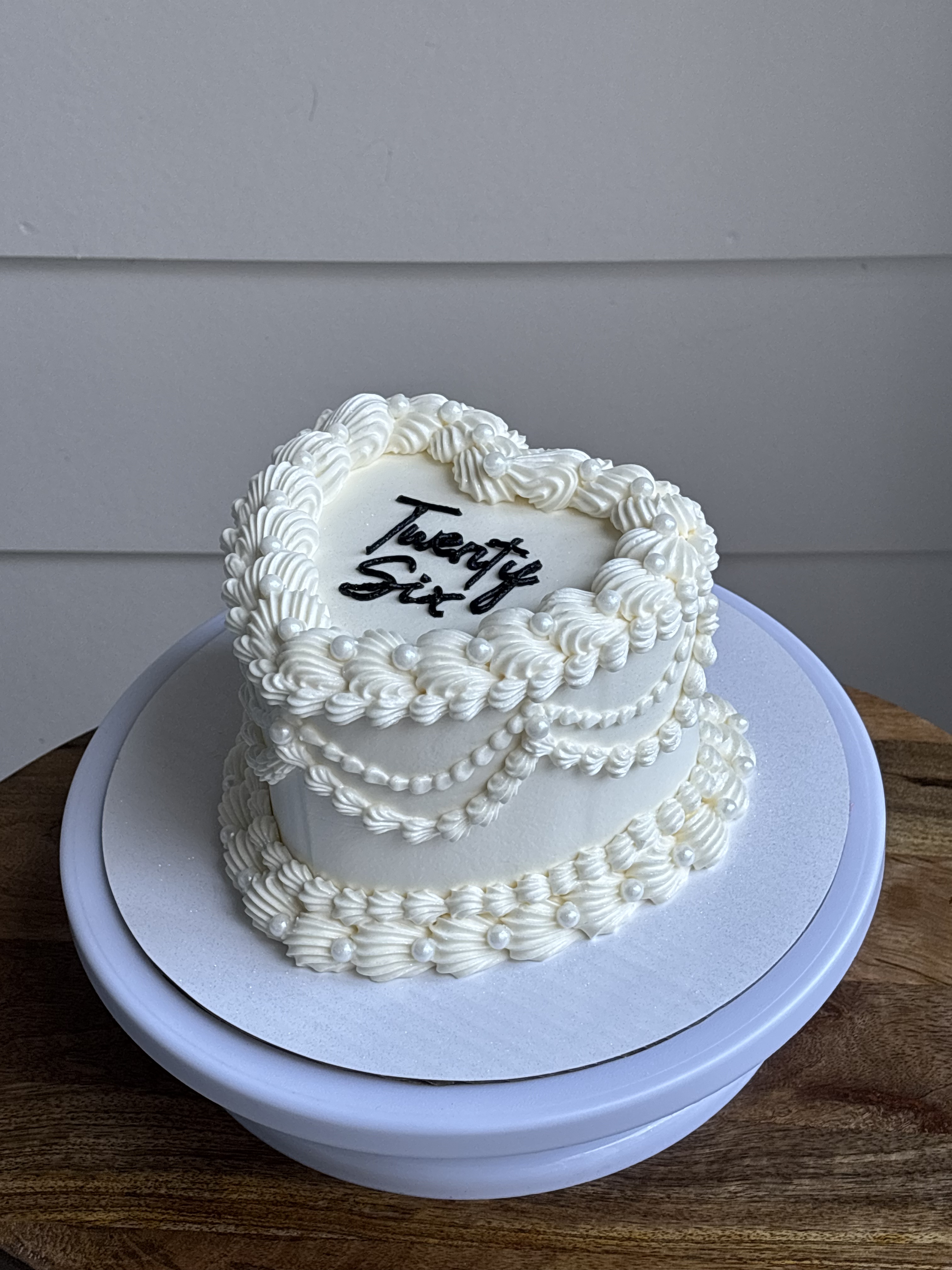 White twenty six heart cake